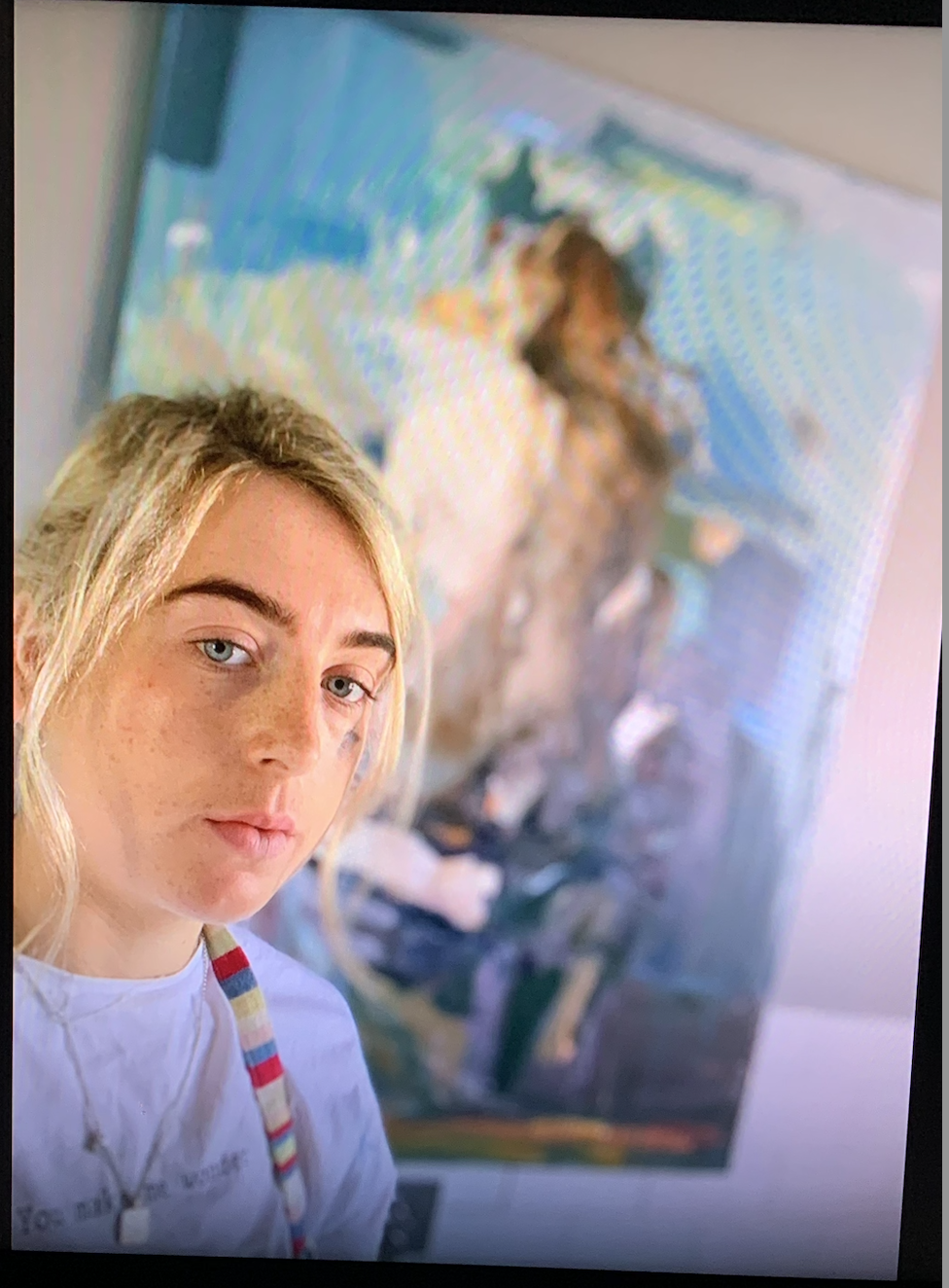 Portrait of artist Olivia Tew in her studio