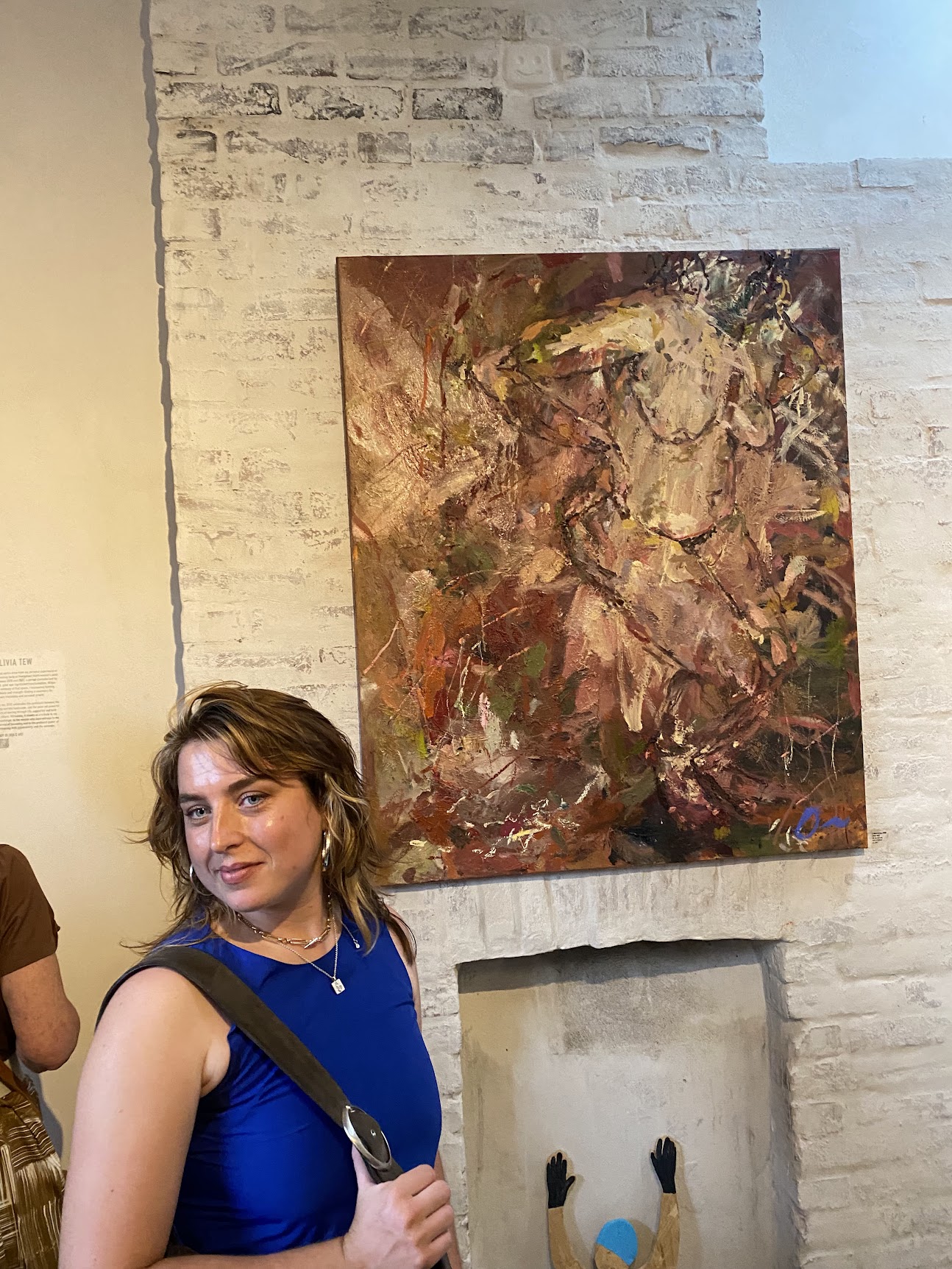 Olivia Tew with her expressionistic figure painting